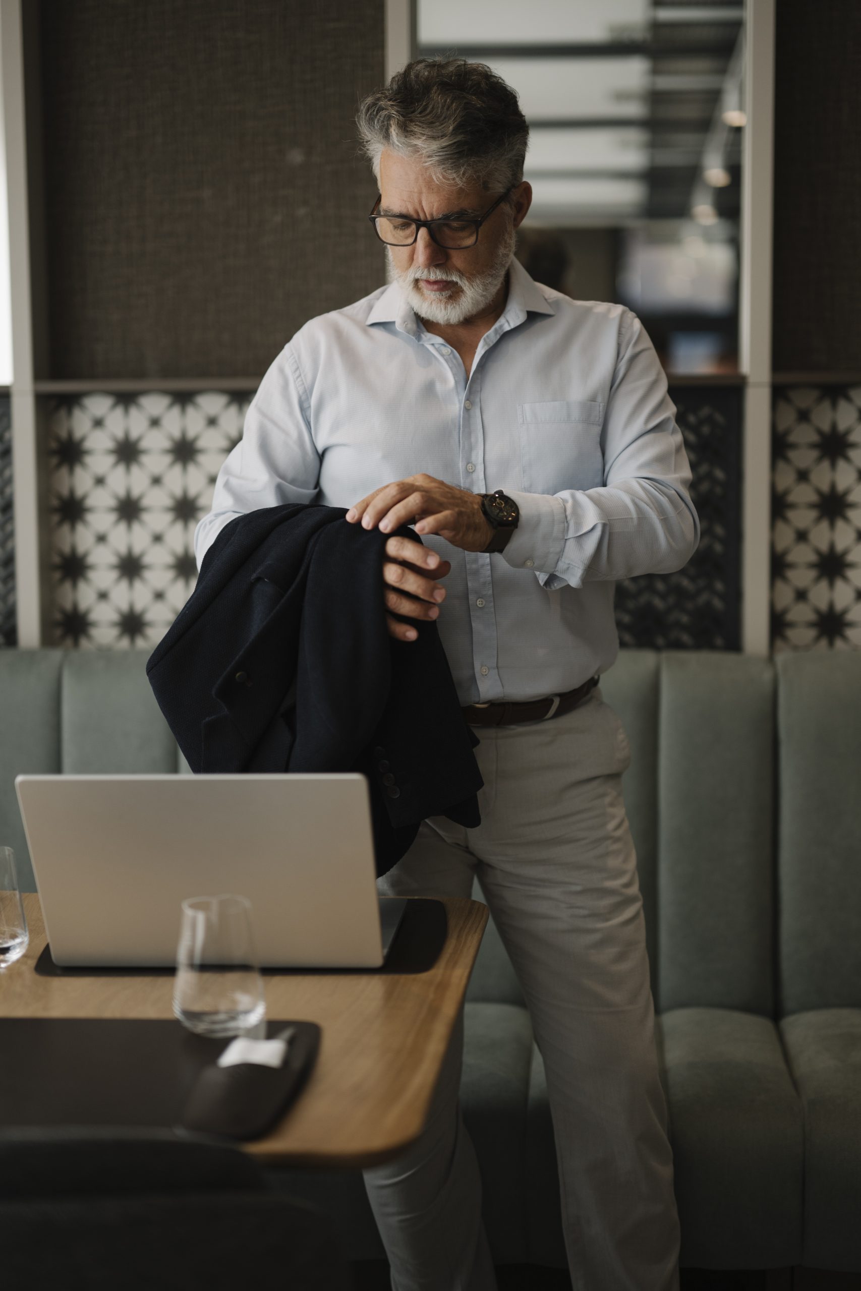 Business professional preparing a Shopware strategy and development planning review on a laptop