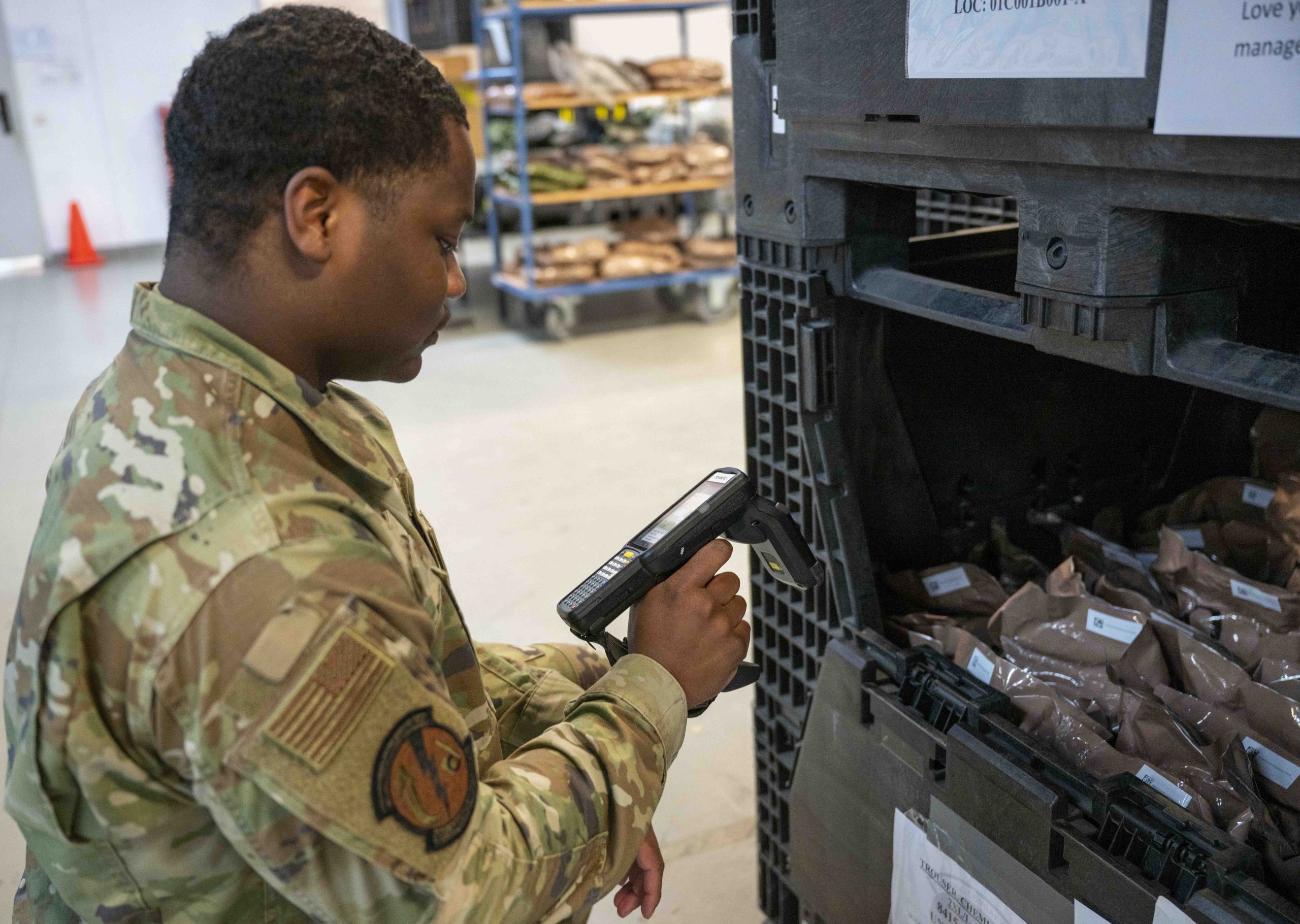 Warehouse team member scanning inventory for ecommerce data cleanup