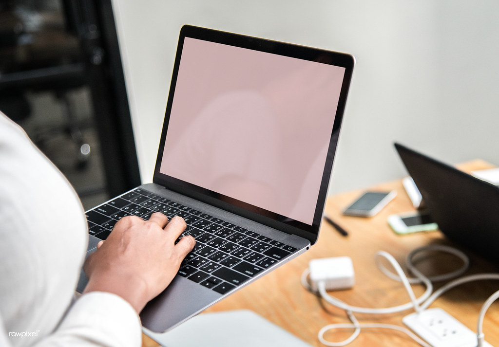 Business team reviewing website pages and internal links on a laptop