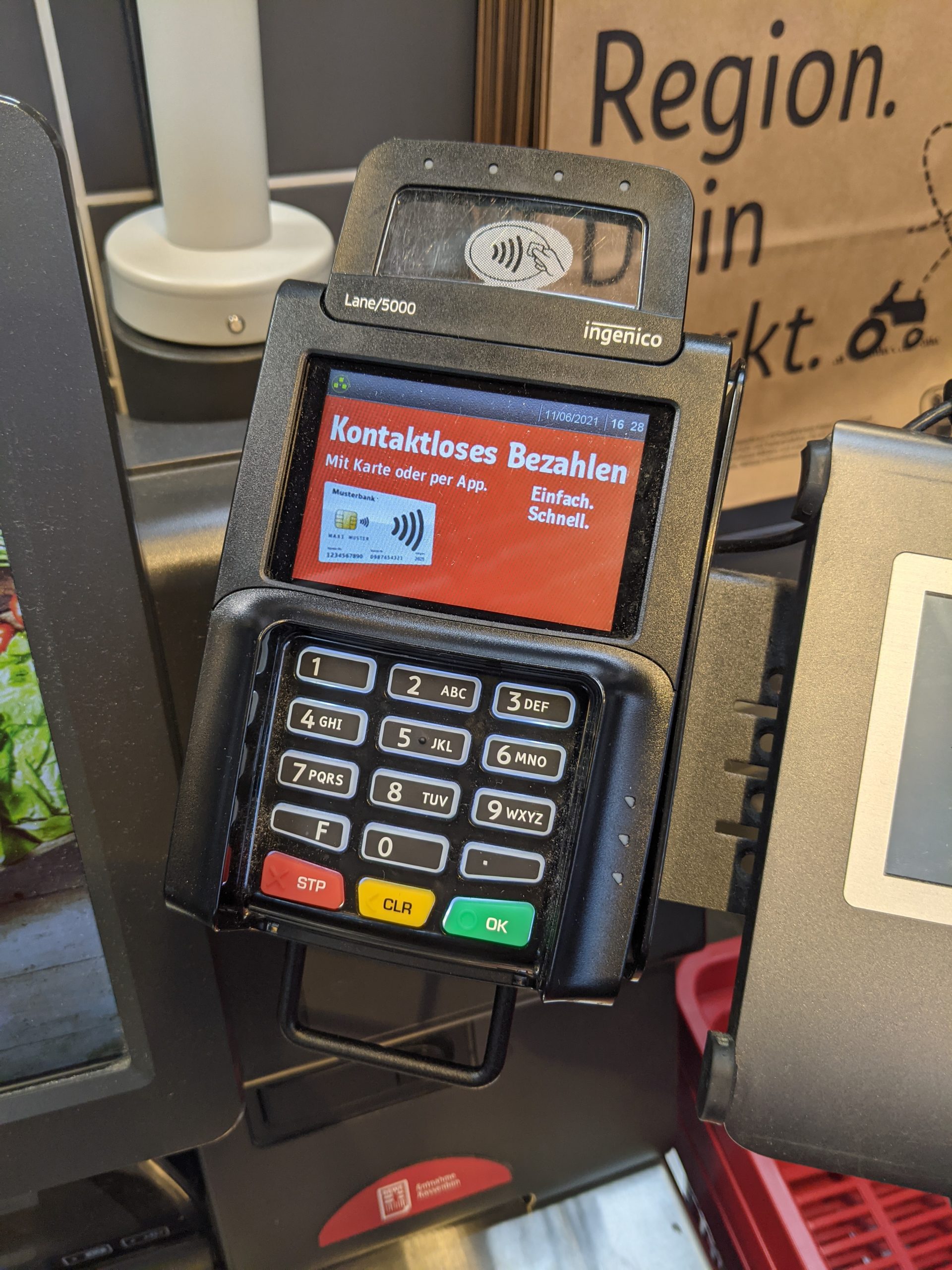 Payment terminal at a self-checkout representing ecommerce checkout security and customer trust signals