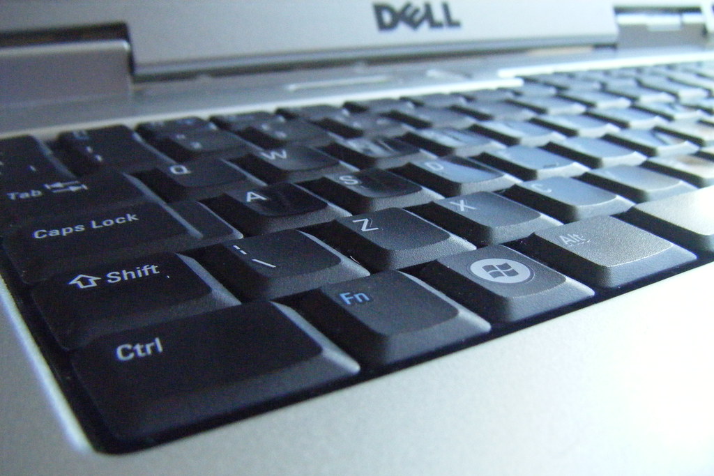 Close-up photograph of a Dell laptop keyboard
