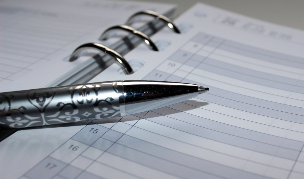 Pen and appointment calendar for planning service appointments